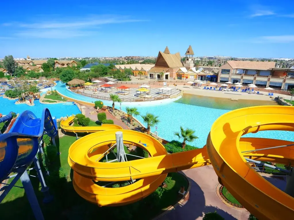 Жълти спирални пързалки – Pickalbatros Jungle Aqua Park Resort - Neverland Hurghada, Хургада