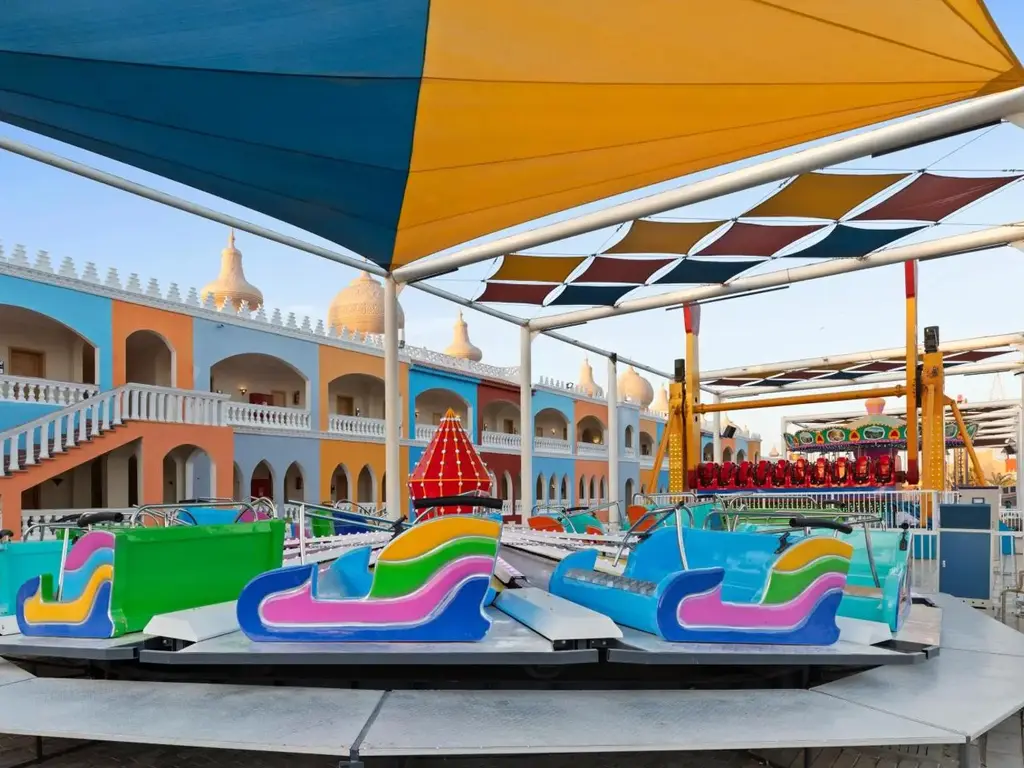 Детски колички под цветни навеси – Pickalbatros Jungle Aqua Park Resort - Neverland Hurghada, Хургада