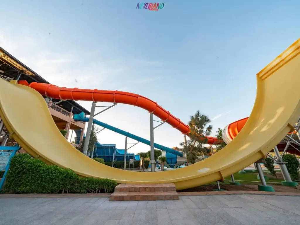 Жълта пързалка бумеранг – Pickalbatros Jungle Aqua Park Resort - Neverland Hurghada, Хургада