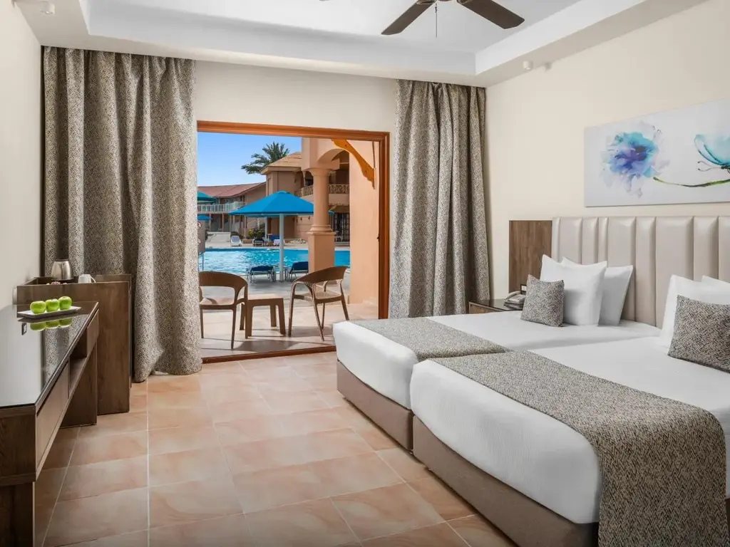 Две легла и тераса с изглед към басейна – Pickalbatros Jungle Aqua Park Resort - Neverland Hurghada, Хургада