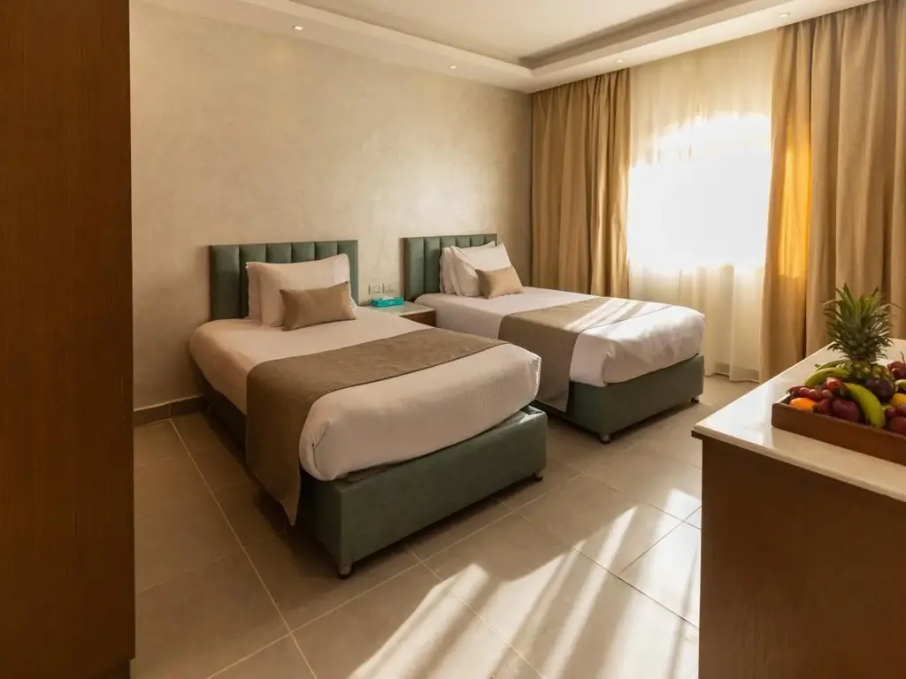 Стая с две единични легла, кошница с плодове и гардероб – Sunrise Aqua Joy Resort, Хургада